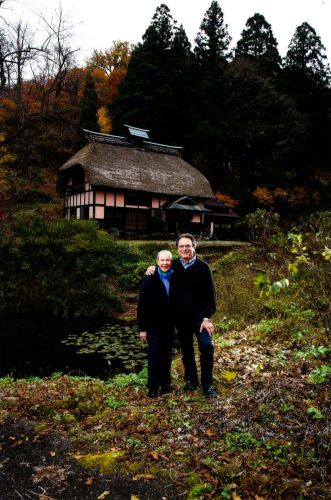 Mr and Mrs Bengs in front of Sokakuan, revived Kominka, old thatched roof farm house in Taketokoro, Tokamachi, Niigata, Japan. 